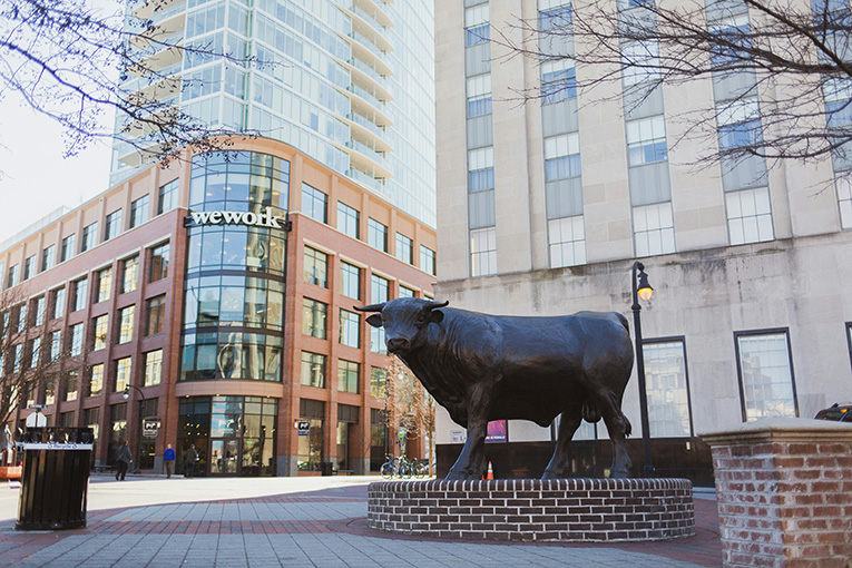 Daytime image of the bull statue in downtown Durham, which used to be known as the Bull City.