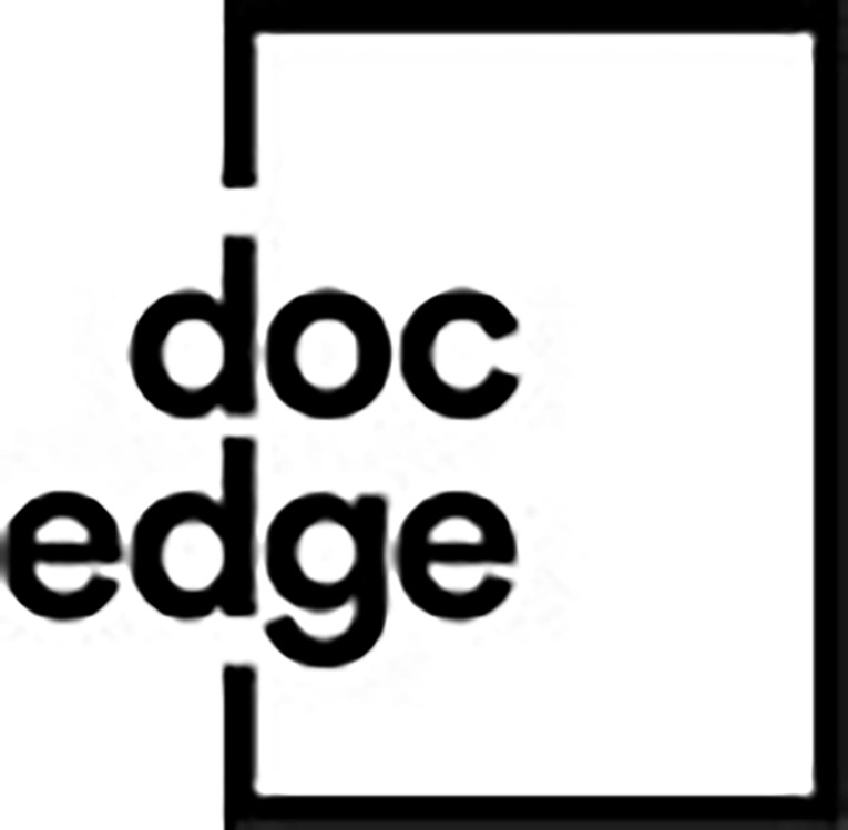 The logo for Doc Edge, lower case letters overlapping a black rectangle with a white background.